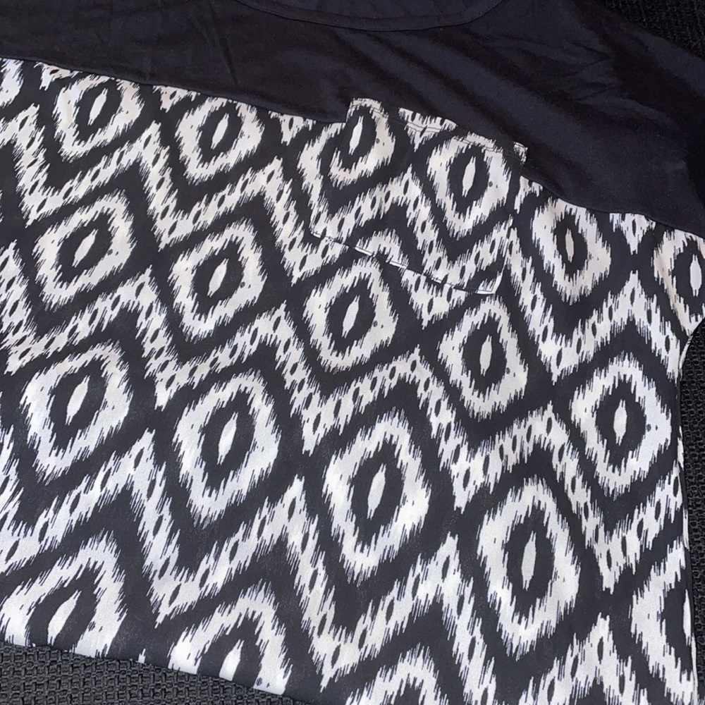 Exhilaration shirt size medium.